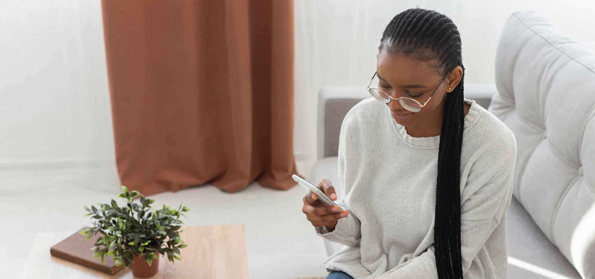 Woman on a phone speaking to a support consultant
